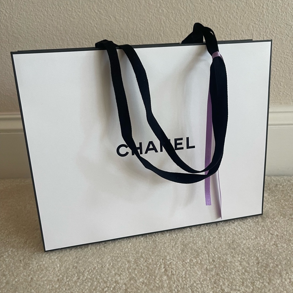 Chanel Signature White Bag with Black Handles and Purple Ribbon